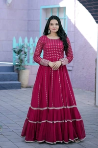Faux Blooming gown with Sequins Multi Silver jari Embroidered Work  It looks graceful for women  it Designed to flatter all body types gowns for women combine the best parts of western and Indian wear into one stunning ensemble - wine