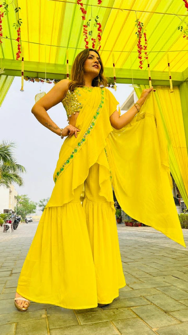 GET READY FOR UPCOMING FESTIVITIES AND WEDDING CELEBRATIONS WITH THIS GARARA DRAPE READY TO WEAR SAREE WITH TWO BLOUSE OPTIONS EMBELLISHED WITH REAL MIRROR HAND WORK AND ZARI EMBROIDERY, KAUDI HANGINGS. - Xs (34)