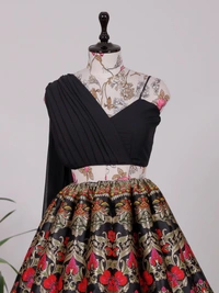 Step into with our best lehenga weaved perfectly and beautifully crafted with Banarasi design detailing This look is perfect of all your shaadi season styles be it sangeet  pooja kitty parties or brunches - Black