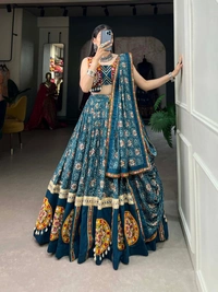 Radiate Festive Elegance in a Pure Rayon Navratri Chaniya Choli, Complete with Sophisticated Printed Foil Work and Gamthi Patch & Lace Touch-Up 💫
