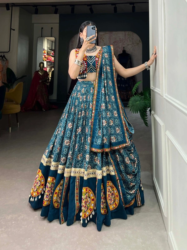 Radiate Festive Elegance in a Pure Rayon Navratri Chaniya Choli, Complete with Sophisticated Printed Foil Work and Gamthi Patch & Lace Touch-Up 💫