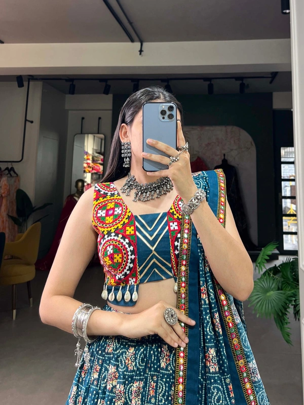 Radiate Festive Elegance in a Pure Rayon Navratri Chaniya Choli, Complete with Sophisticated Printed Foil Work and Gamthi Patch & Lace Touch-Up 💫
