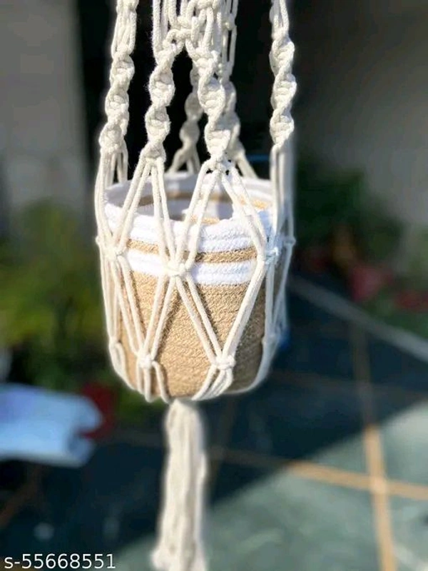 Macrame PCENFAP014 Multi Plant Pot Hanger, 2 TierName: Macrame Multi Plant Pot Hanger, 2 TierMaterial: FabricShape: ContemporaryType: HangingProduct Breadth: 6 InchProduct Height: 52 InchProduct Length: 6 InchNet Quantity (N): Pack Of 1Plant pot holder made in cotton macrame.