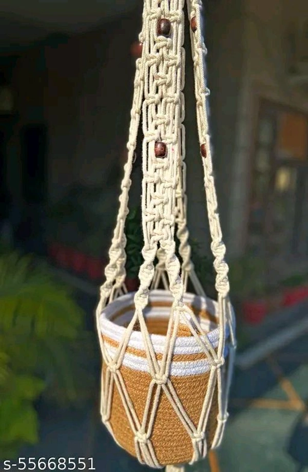 Macrame PCENFAP014 Multi Plant Pot Hanger, 2 TierName: Macrame Multi Plant Pot Hanger, 2 TierMaterial: FabricShape: ContemporaryType: HangingProduct Breadth: 6 InchProduct Height: 52 InchProduct Length: 6 InchNet Quantity (N): Pack Of 1Plant pot holder made in cotton macrame.