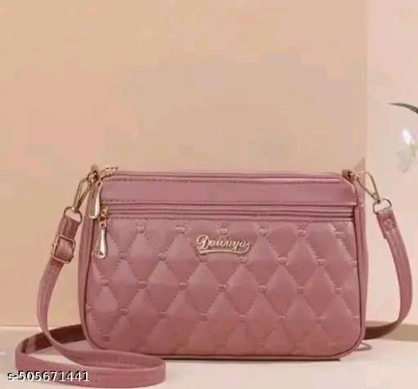 Stylish Classic Girls and Womens Sling bag Gorgeous Stylish Handba....
Name: Stylish Classic Girls and Womens Sling bag Gorgeous Stylish Handba....
Material: PU
No. of Compartments: 2
Pattern: Solid
Net Quantity (N): 1
Sizes:Free Size (Length Size: 10 in, Width Size: 4 in, Height Size: 6 in) 

Country of Origin: India