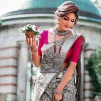 GRACEFUL ART SILK SILVER SAREE WITH RANI BLOUSE