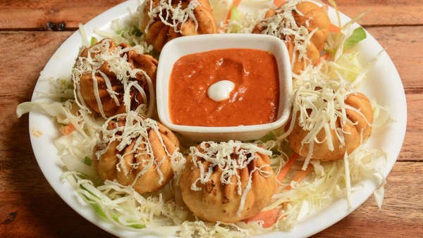 Cheese Kurkury Momos  - Obra
