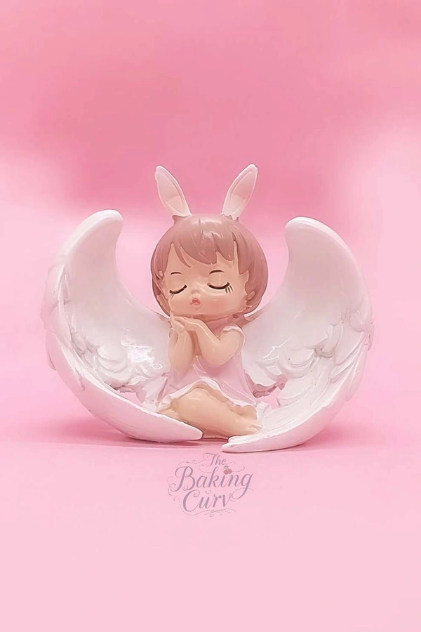 The Baking Curv Sleeping Angel Bunny Figurine