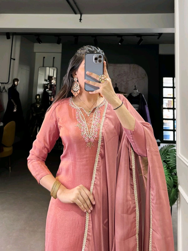 Graceful Peach Ethnic Suit With Handwork And Lace Touch Up