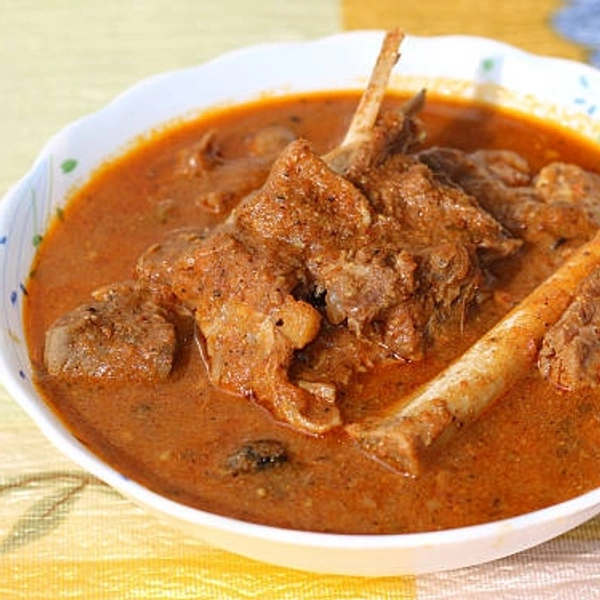 Mutton Curry (4 Pcs) - Suruchi Hotel & Restaurant