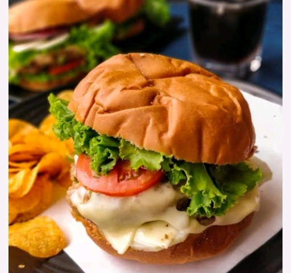 Veg. Cheese  Burger  - Sainthia Momo Junction