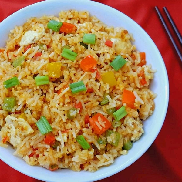Schezwan Egg Fried Rice  - Bagicha Restaurant