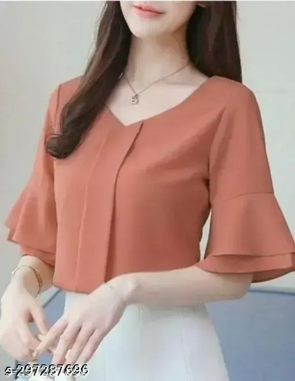 Name : Classic peach colour Tai up neck women stylish fashionable trendy party wear top  Fabric : Crepe  Sleeve Length : Three-Quarter Sleeves  Pattern : Solid - S (Bust Size : 34 in, Length Size: 23 in)  M (Bust Size : 36 in, Length Size: 24 in)  XL (Bust Size : 40 in, Length Size: 26 in), PEACH