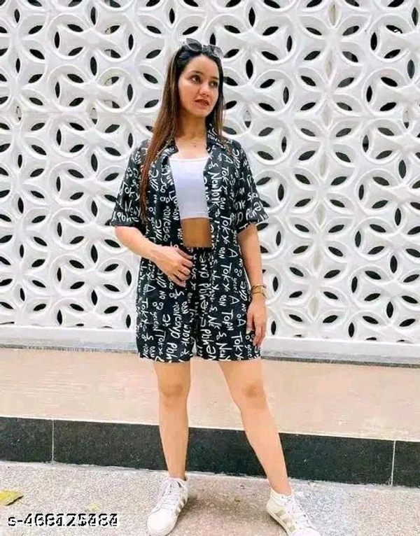 Women co-set with shorts 
Name: Women co-set with shorts 
Top Fabric: Crepe
Bottom Fabric: Crepe
Sleeve Length: Short Sleeves
Net Quantity (N): 2
Sizes: 
S (Top Bust Size: 34 in, Top Length Size: 19 in, Top Hip Size: 34 in, Bottom Waist Size: 23 in, Bottom Hip Size: 23 in, Bottom Length Size: 17 in)  - Black, L