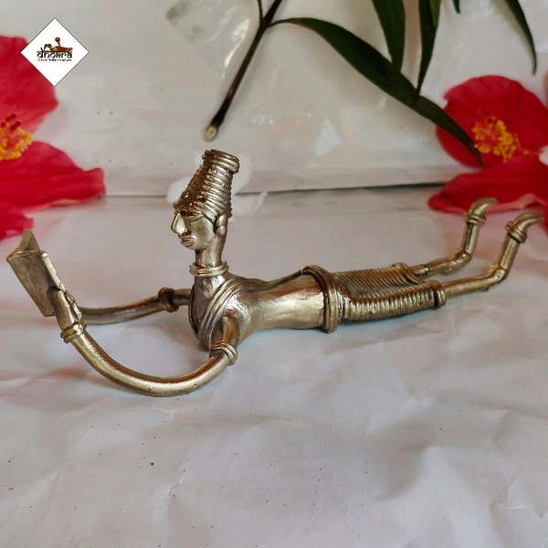 Dhokra Art of a Tribal Lady Reading a Book in Sleeping Posture - Length 6 Inch