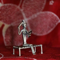 Dhokra Crafted - Lady Sitting On Cot  - Height 5 Inch