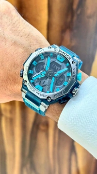 BRAND:- CASIO                                                                               G-SHOCK BEST QUALITY MEN'S WATCH                            DIAL:-BLUE                                                               BLUE BELT - Cyan Aqua, ALL