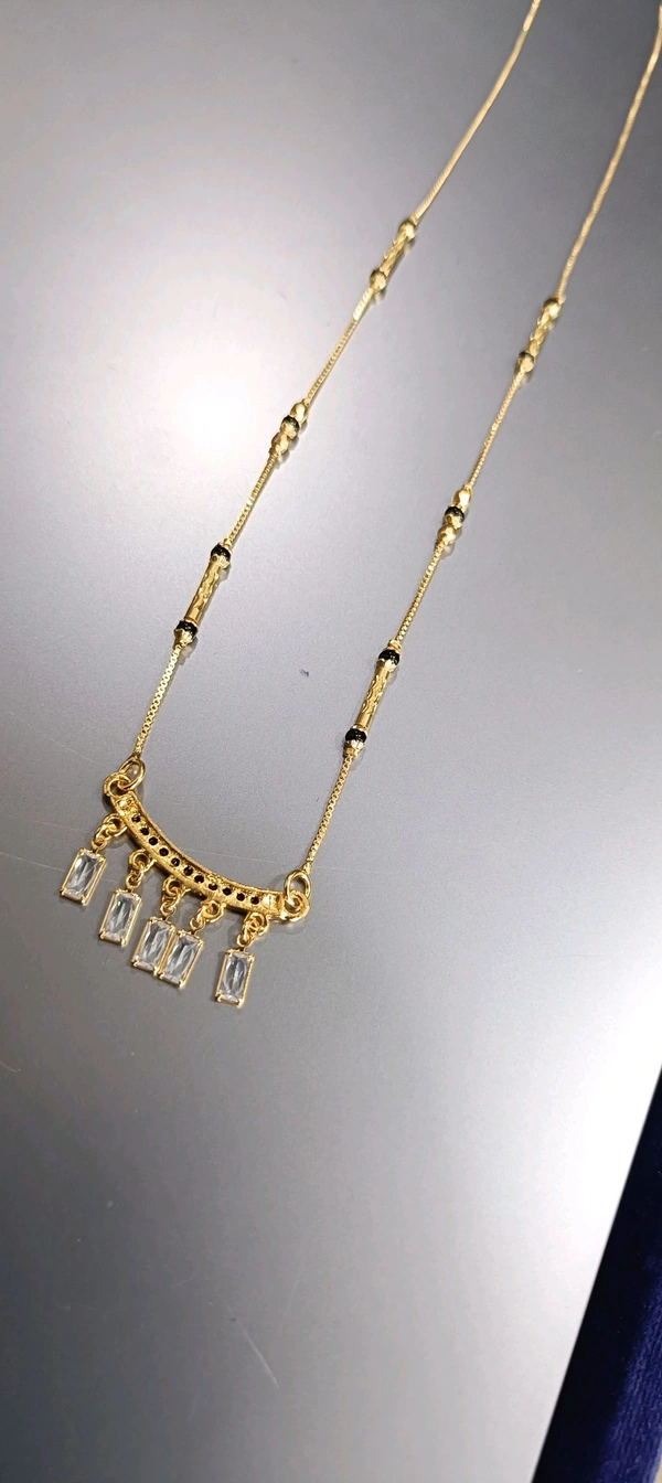 White Drop Black Beeds