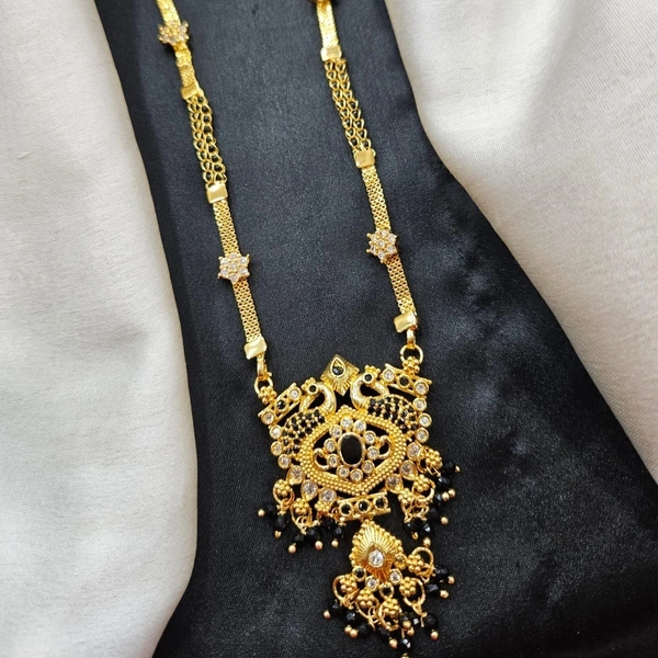 macro gold black beed