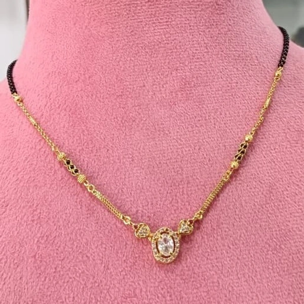 white drop black beed