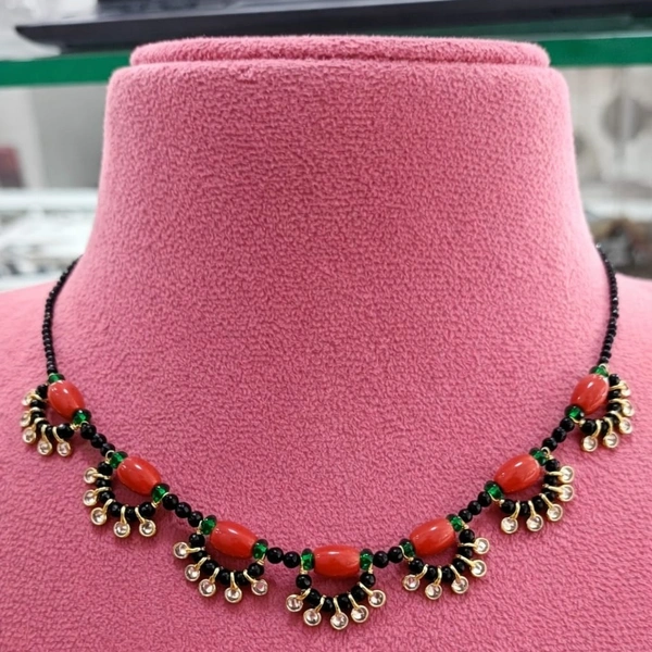 coral with white drops neck set