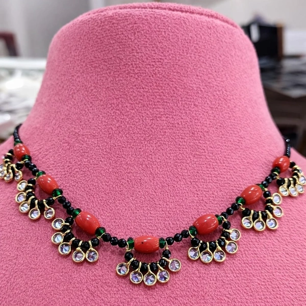 coral with violet drops neck set
