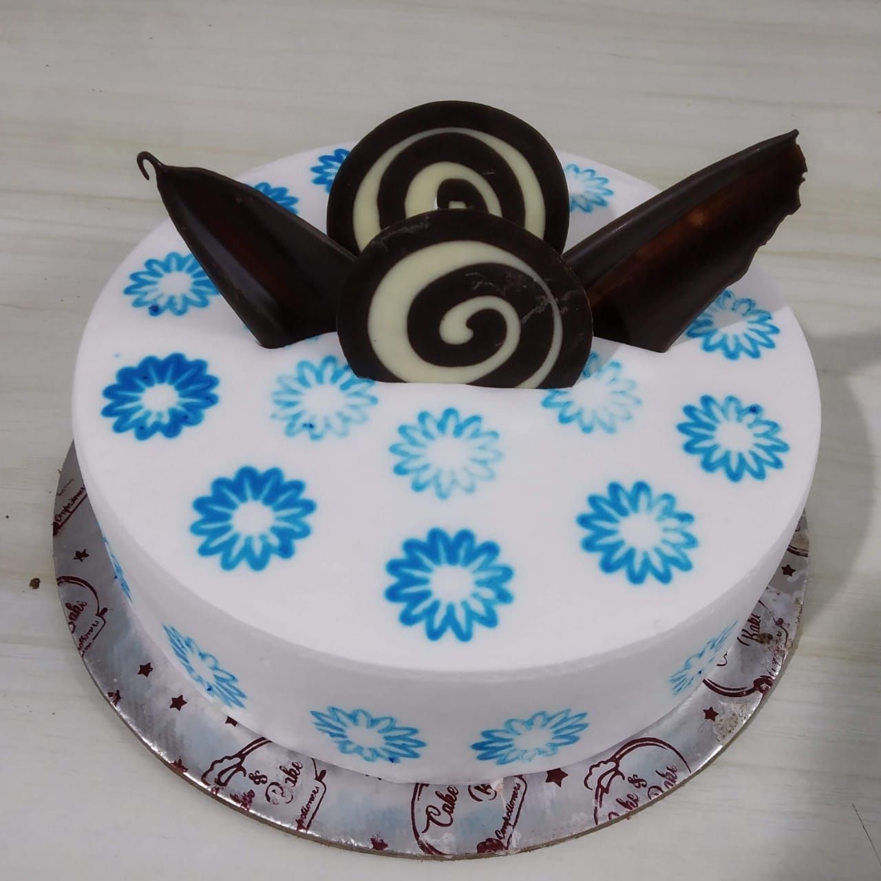 Chocolate with vanilla cake garnish with cherry Stock Photo - Alamy