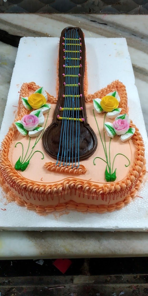 Acoustic guitar cake | Guitar cake, Music cakes, Guitar birthday cakes
