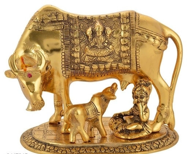 Silver plated   kamdenu cow Statu Calf along with Balkrishana  - Yellow Orange