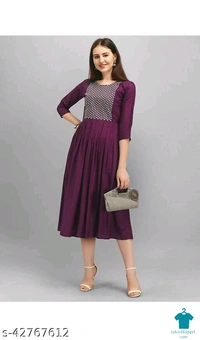 Product Name: *Aagyeyi Attractive Kurtis*Fabric: RayonSleeve Length: Three-Quarter SleevesPattern: EmbroideredCombo of: Single - colour- Maroon, size- XL