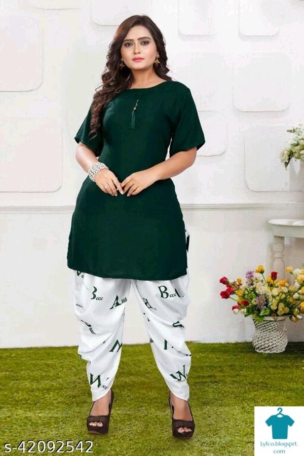 Product Name: *JNS NEW LUNCH KURTA WITH DIGITAL PRINT DHOTI*Kurta Fabric: Rayon - size- M, colour- Dark Green