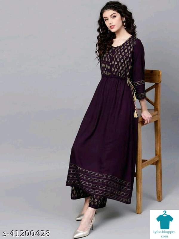 Product Name: *Charvi Attractive Women Kurta Sets*Kurta Fabric: RayonBottomwear Fabric: RayonFabric: RayonSleeve Length: Three-Quarter SleevesSet Type: Kurta With BottomwearBottom Type: PalazzosPattern: PrintedMultipack: Single - size- XL