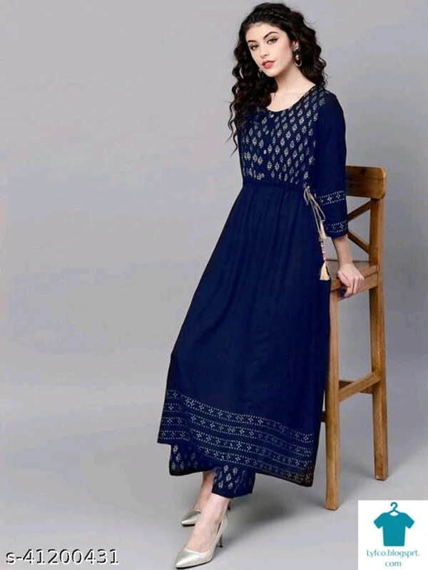 Aagam Fabulous Women Kurta SetsKurta Fabric: RayonBottomwear Fabric: RayonFabric: RayonSleeve Length: Three-Quarter SleevesSet Type: Kurta With BottomwearBottom Type: PalazzosPattern: PrintedMultipack: Single - colour- Dark Green, size- M