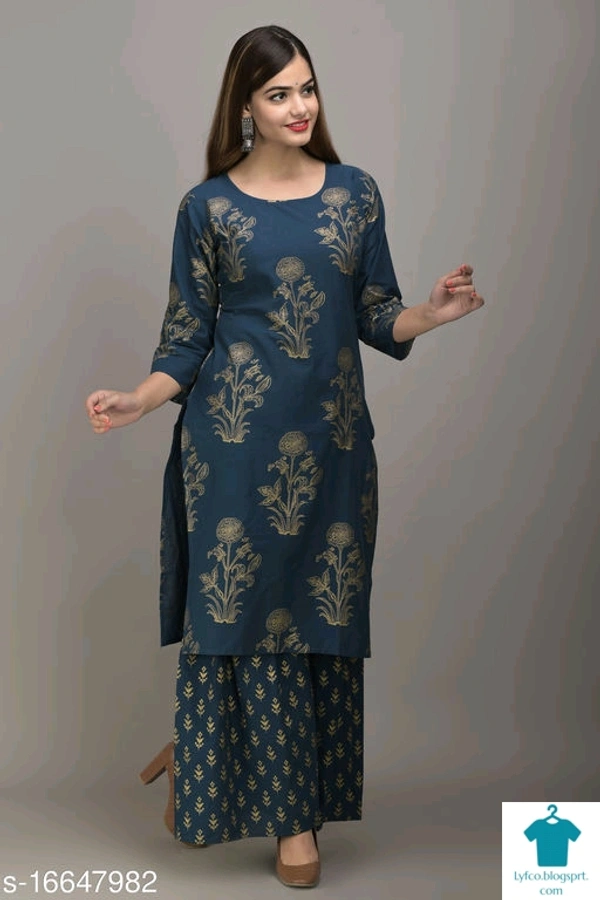 Women's Printed Cotton Blend Kurta Set with ShararaKurta Fabric: Cotton Blend
Bottomwear Fabric: Cotton Blend
Fabric: Cotton Blend
Sleeve Length: Three-Quarter Sleeves
Set Type: Kurta With Bottomwear
Bottom Type: Sharara
Pattern: Printed
Multipack: Single - Colour- Dark Red, Size- XXL