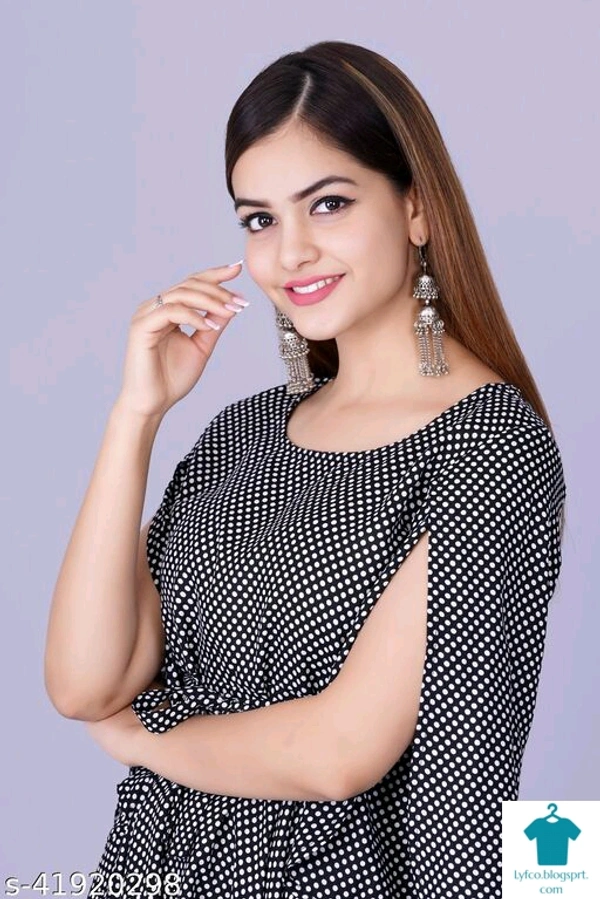 Product Name: *womens Rayon Printed top*Fabric: RayonSleeve Length: Three-Quarter SleevesPattern: PrintedMultipack: 1 - size- S