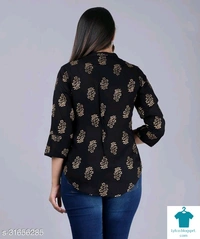Product Name: *Comfy Ravishing Women Tops & Tunics*Fabric: RayonSleeve Length: Three-Quarter SleevesPattern: PrintedMultipack: 1 - size- XXL, colour- light Blue
