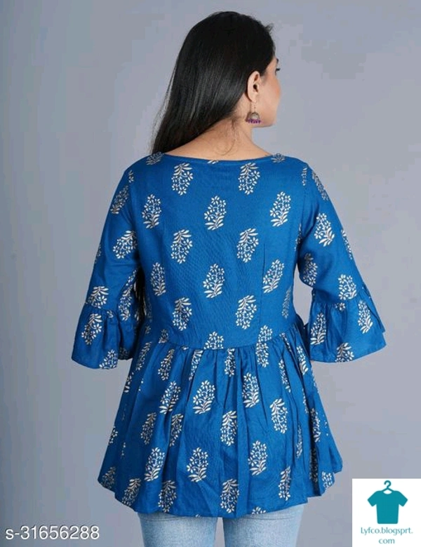 Product Name: *Comfy Fashionable Women Tops & Tunics*Fabric: RayonSleeve Length: Three-Quarter SleevesPattern: PrintedMultipack: 1 - size- S