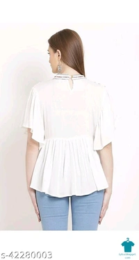 Product Name: *Trendy Glamorous Women Tops & Tunics*Fabric: RayonSleeve Length: Three-Quarter SleevesPattern: EmbroideredMultipack: 1 - size- XL