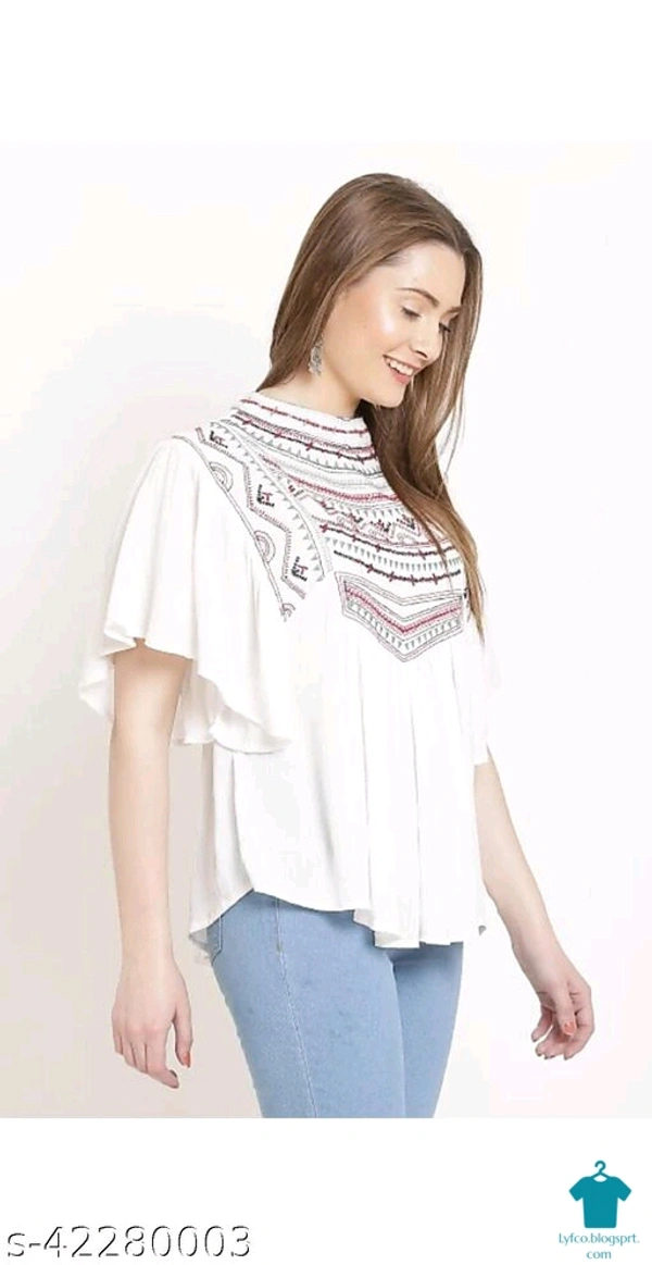Product Name: *Trendy Glamorous Women Tops & Tunics*Fabric: RayonSleeve Length: Three-Quarter SleevesPattern: EmbroideredMultipack: 1 - size- XL