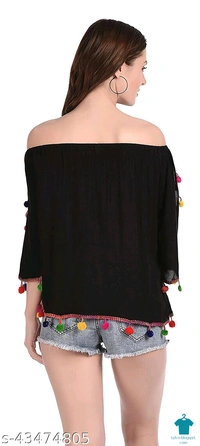 Product Name: *DAMEN MODE Women Rayon Crepe Pom Pom Cutwork Peach Top*Fabric: CrepeSleeve Length: Long SleevesPattern: SolidMultipack: 1 - colour- Black, Free Size (Bust Size: 21 in, Length Size: 22 in) 