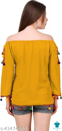 Product Name: *DAMEN MODE Women Rayon Crepe Pom Pom Cutwork Peach Top*Fabric: CrepeSleeve Length: Long SleevesPattern: SolidMultipack: 1 - colour- Black, Free Size (Bust Size: 21 in, Length Size: 22 in) 