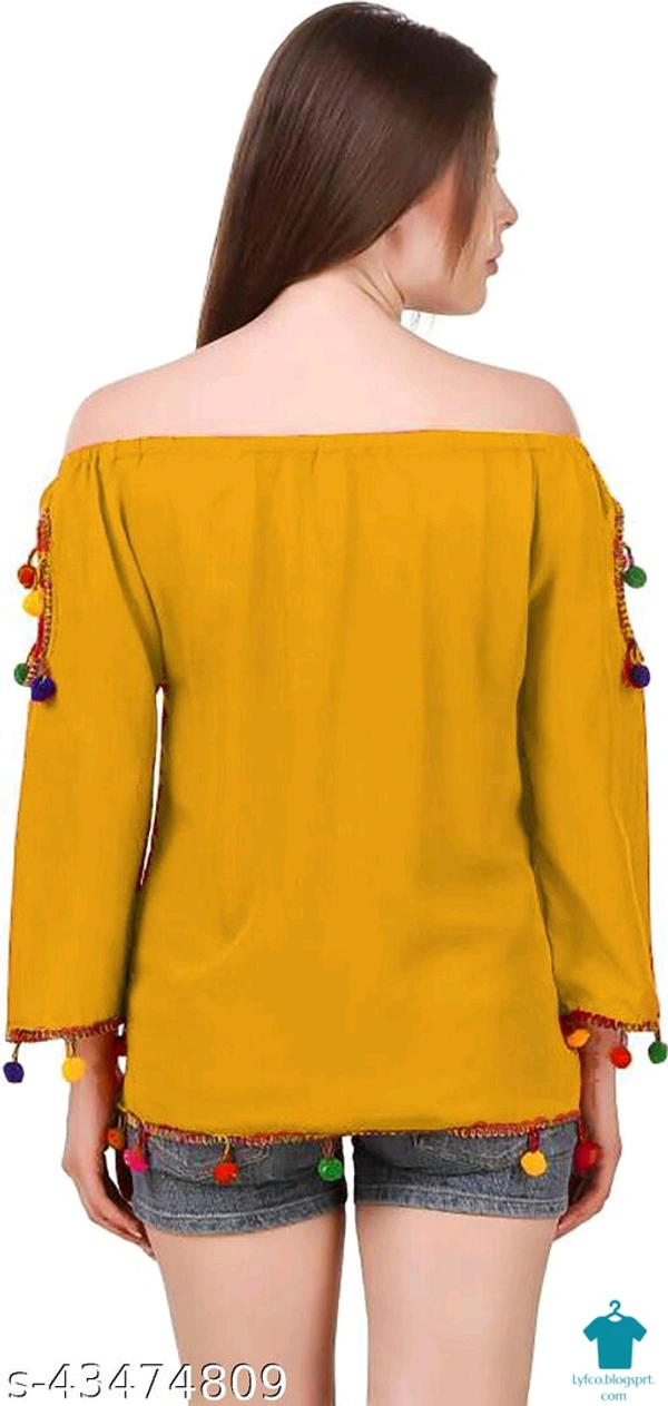 Product Name: *DAMEN MODE Women Rayon Crepe Pom Pom Cutwork Peach Top*Fabric: CrepeSleeve Length: Long SleevesPattern: SolidMultipack: 1 - colour- Black, Free Size (Bust Size: 21 in, Length Size: 22 in) 