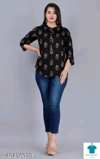 Product Name: *Pretty Partywear Women Tops & Tunics*Fabric: RayonSleeve Length: Three-Quarter SleevesPattern: PrintedMultipack: 1 - size- M