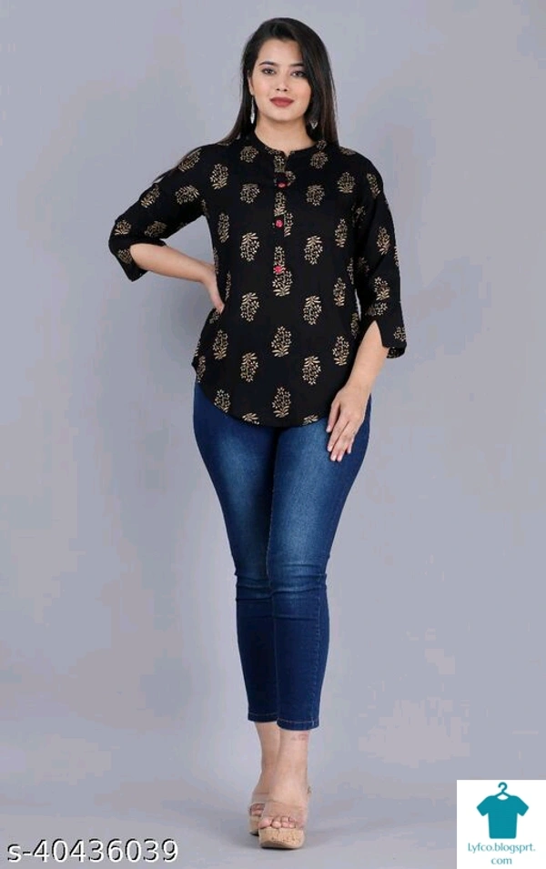 Product Name: *Pretty Partywear Women Tops & Tunics*Fabric: RayonSleeve Length: Three-Quarter SleevesPattern: PrintedMultipack: 1 - size- M