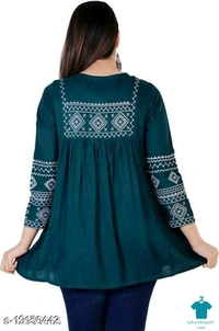 Product Name: *Shree Shyam Fashion Green Colored Girls Top with Embroidery work .*Fabric: RayonSleeve Length: Three-Quarter SleevesPattern: EmbroideredMultipack: 1 - XXxL