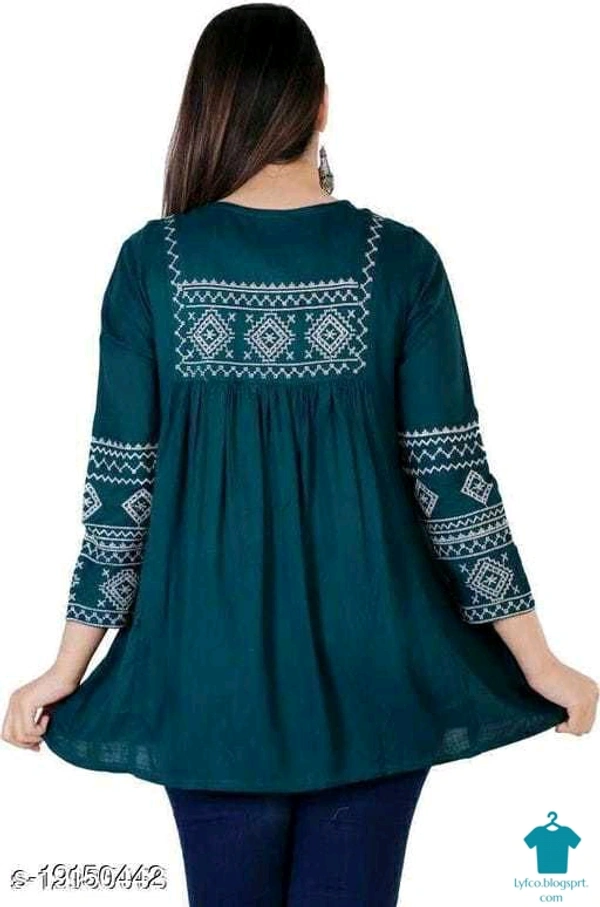 Product Name: *Shree Shyam Fashion Green Colored Girls Top with Embroidery work .*Fabric: RayonSleeve Length: Three-Quarter SleevesPattern: EmbroideredMultipack: 1 - XXxL