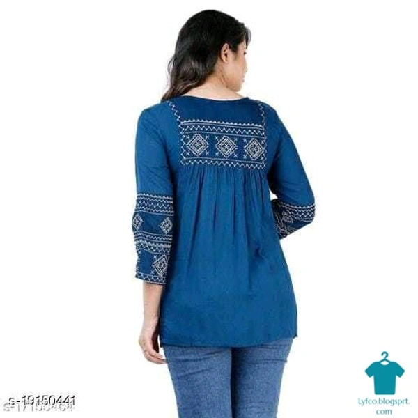 Product Name: *Shree Shyam Fashion Green Colored Girls Top with Embroidery work .*Fabric: RayonSleeve Length: Three-Quarter SleevesPattern: EmbroideredMultipack: 1 - M