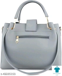 Product Name: *Women PU leather handbag & sling combo of 3*Material: PUNo. of Compartments: 1Pattern: SolidType: Bag with PouchMultipack: 3 - Free size