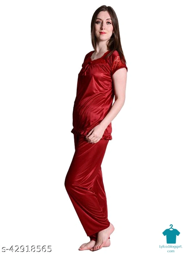 Product Name: *Nightdoll Maroon Satin Nightwear Night Suit Top & Pajama Set*Top Fabric: SatinBottom Fabric: SatinTop Type: Regular TopBottom Type: PyjamasSleeve Length: Short SleevesPattern: SolidMultipack: 1 - XXL