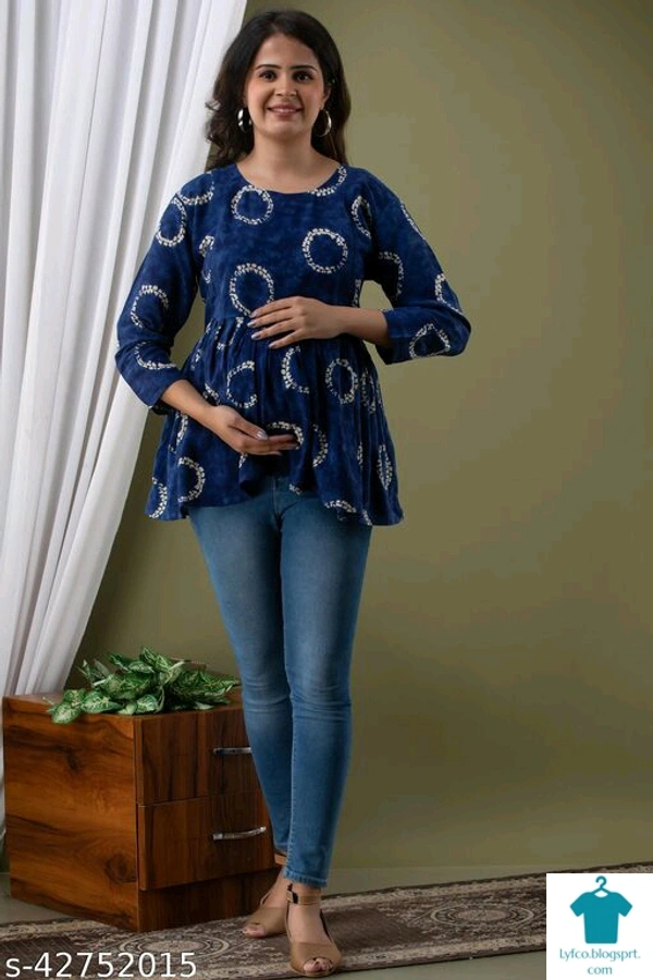 Catalog Name:*Stylus Women Tops & Tunics*Fabric: RayonSleeve Length: Three-Quarter SleevesPattern: Product DependentMultipack: 1 - colour- Black